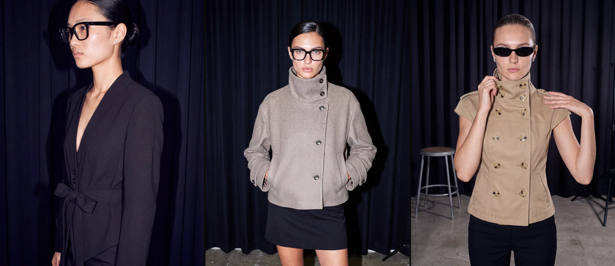 Three Mantel and Moss looks backstage: a belted black blazer, a stand-collar wool jacket and a sleeveless trench vest