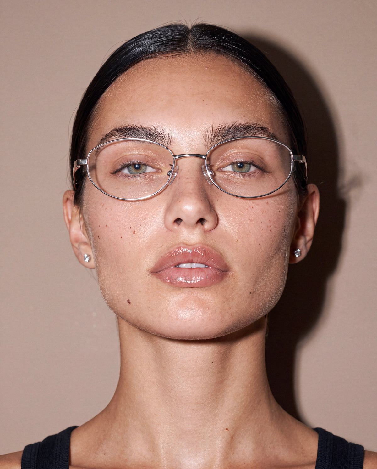 Thin Wire Oval Blue Light Glasses worn by model