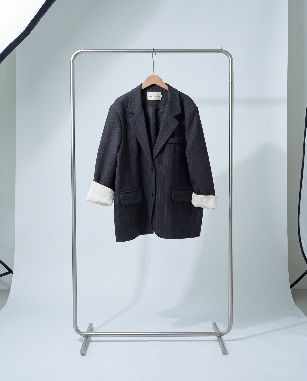 Charcoal Pinstripe Blazer on a clothes rail