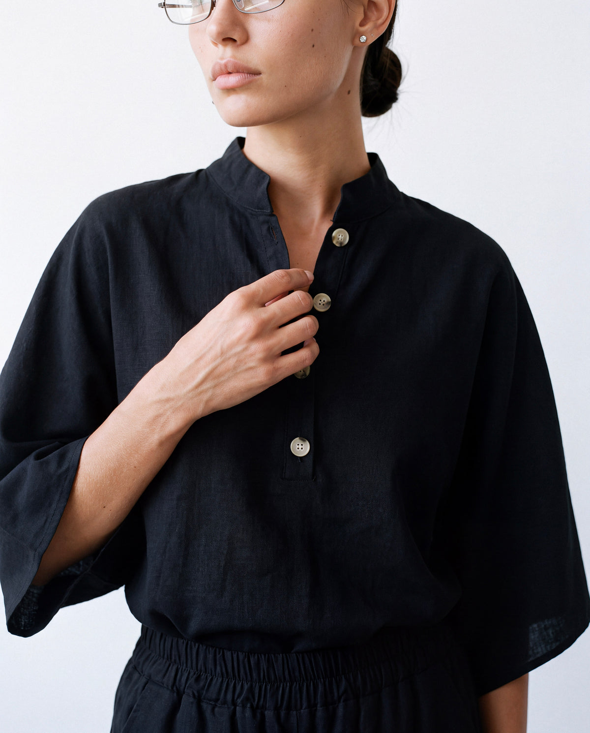 Band-Collar Shirt Set in black worn by model, close-up