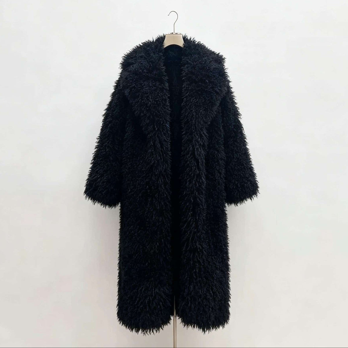 Shaggy Faux Fur Longline Coat in black, front view
