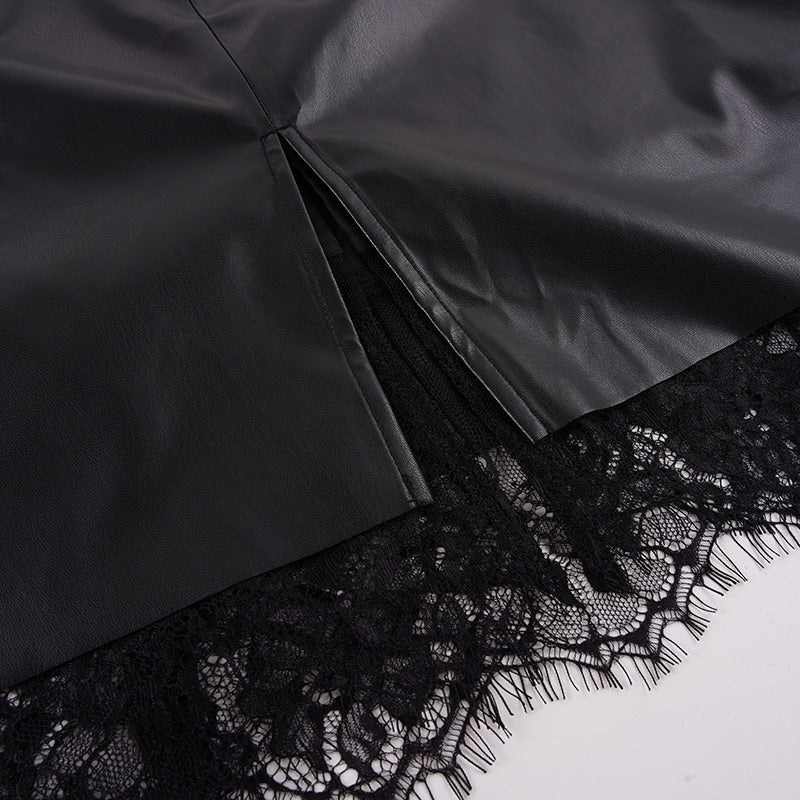 Close-up of the black eyelash lace hem and back slit of the Lace-Trim Faux Leather Midi Skirt