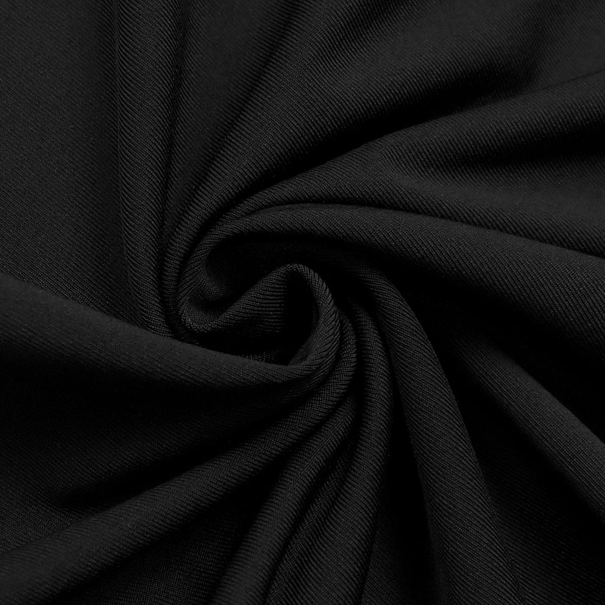 Close-up of the black satin-jersey skirt fabric of the Velvet Sequin High Neck Maxi Dress