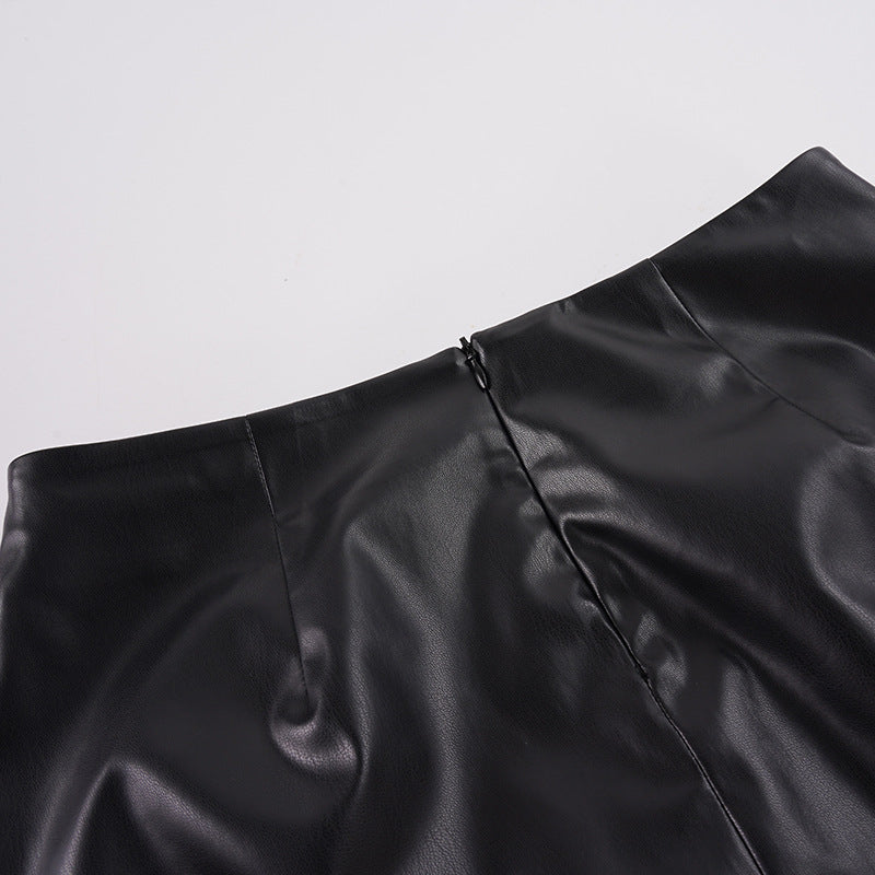 Close-up of the waistband, darts and centre-front seam of the Lace-Trim Faux Leather Midi Skirt