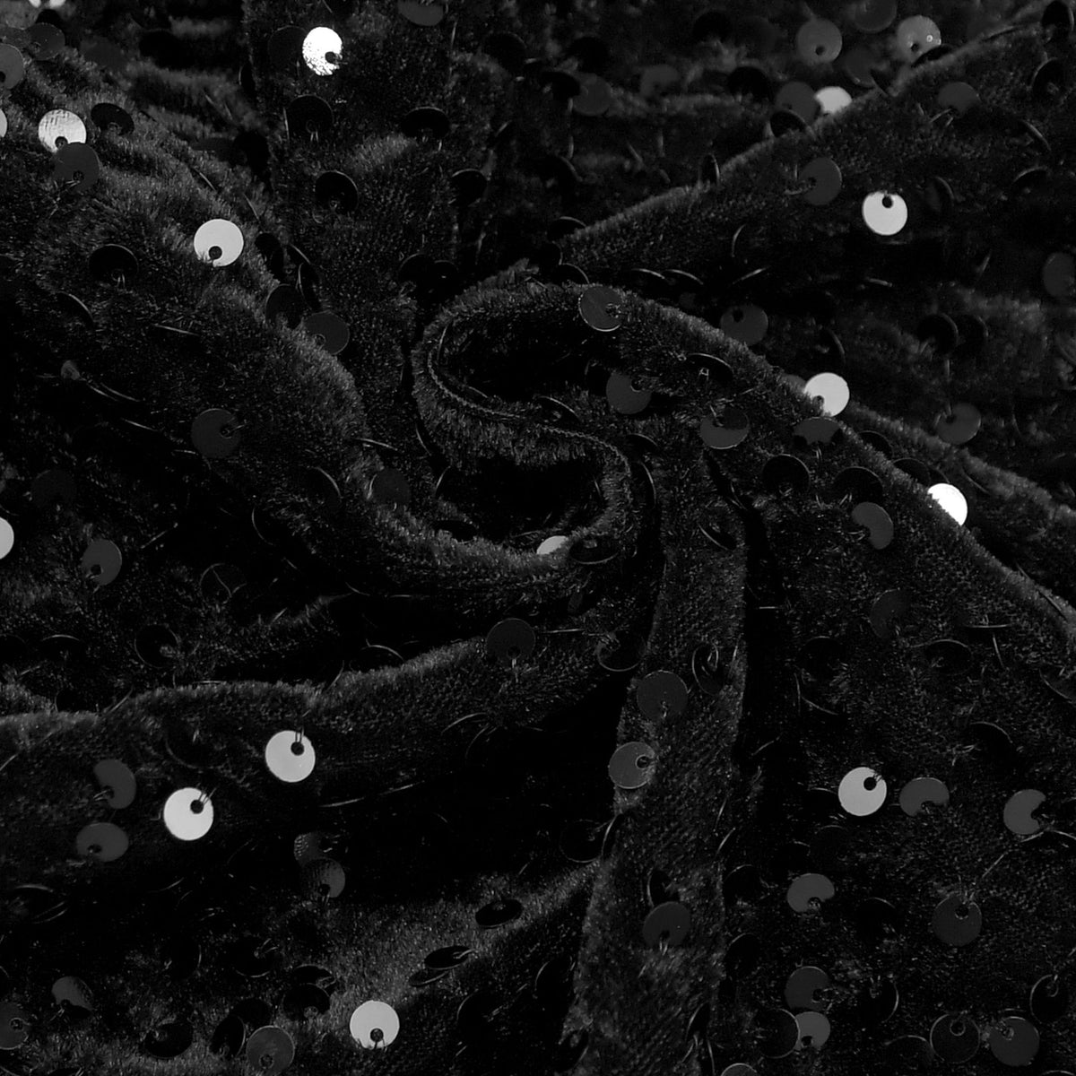Close-up of the black sequins on velvet of the Velvet Sequin High Neck Maxi Dress